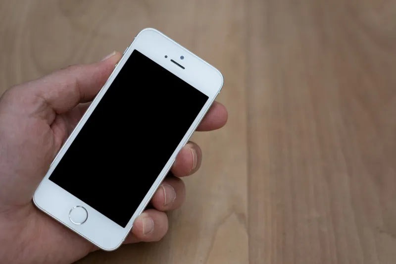 Sinister by Design: How the Mobile Industry Has Spent Two Decades Failing Left-Handed Users